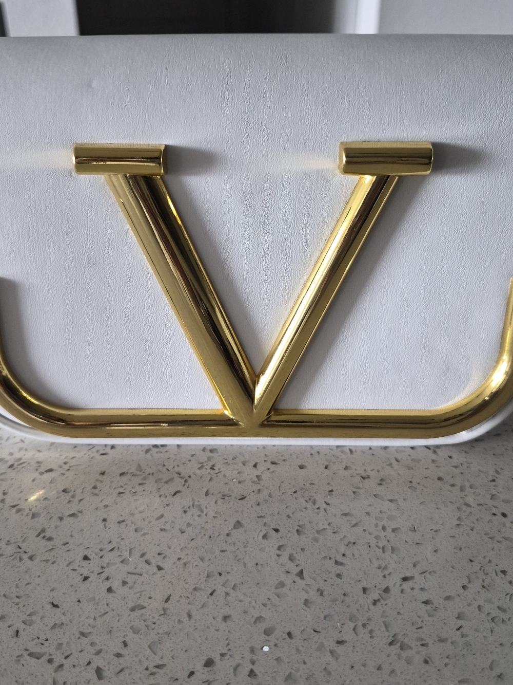 White Crossbody Bag with Gold 'V' Accent